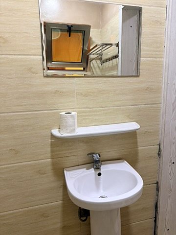Salle d'eau privée d'une chambre d'hospitalisation